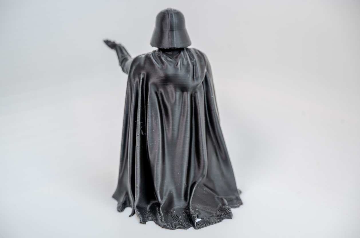 Side view of Darth Vader desk pen holder with cape detail