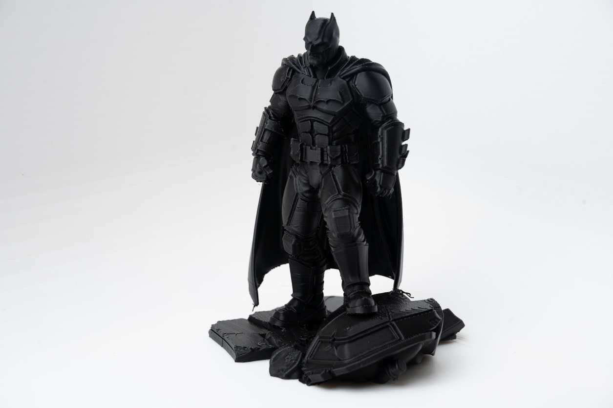 3D printed superhero diorama three-quarter view showing armored suit detail