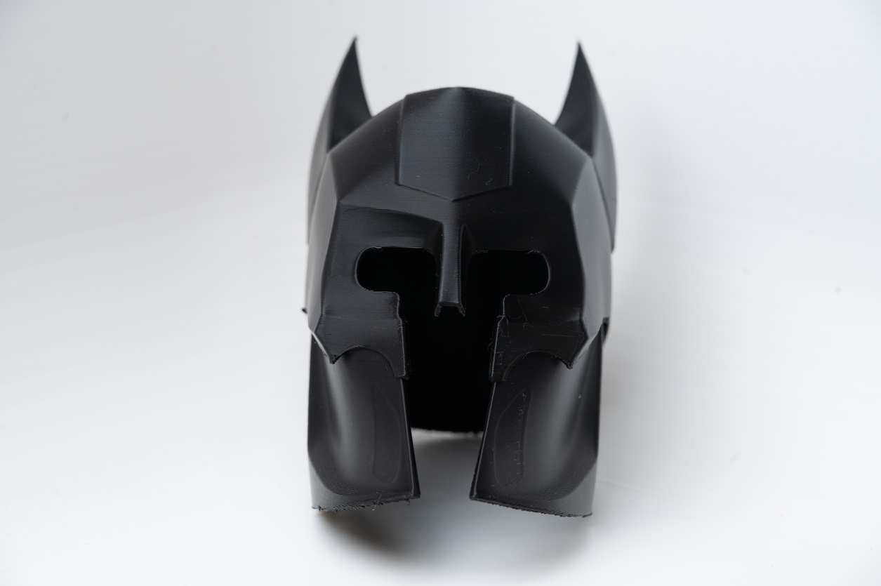 3D printed bat helmet front view in black PLA