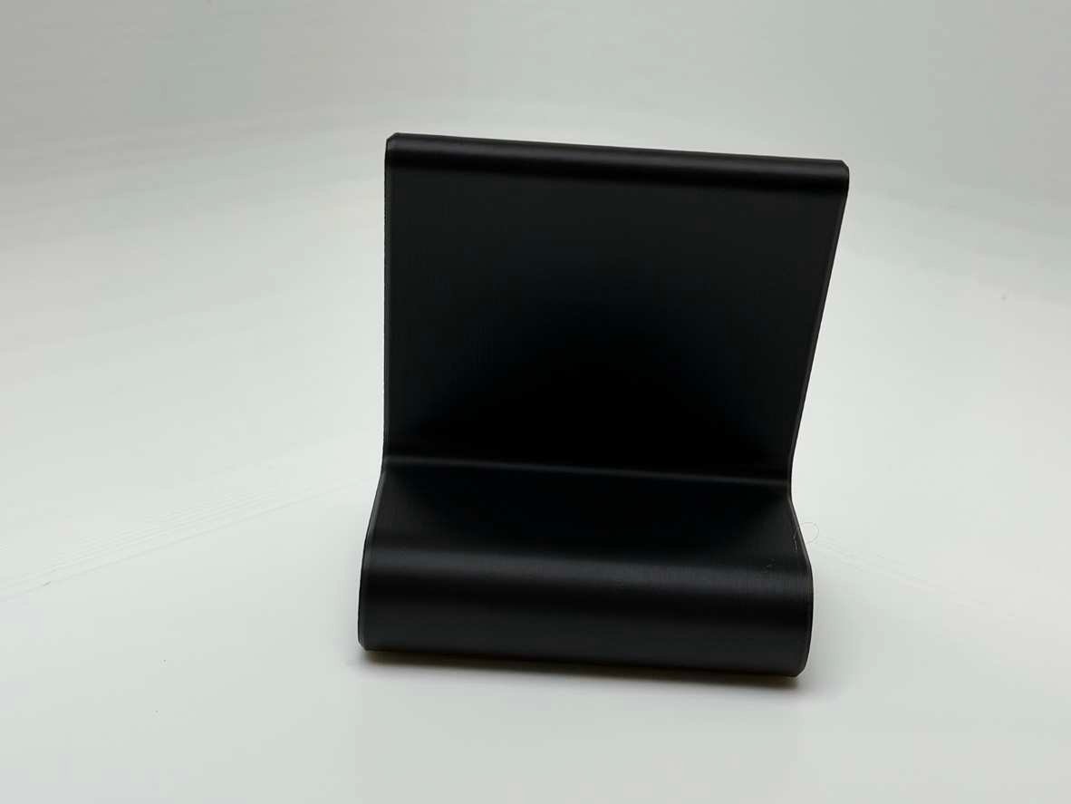 Black PLA phone stand with green streak accent front view