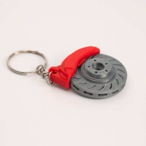 Rotating brake disc keychain with grey rotor and red caliper on metal keyring