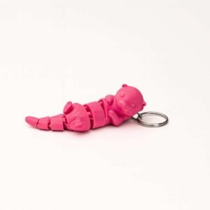 Articulated otter keychain in pink PLA with metal split ring
