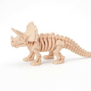 Skeleton triceratops figurine in light bone color, side view