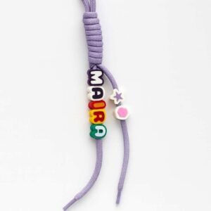 Personalized backpack name tag with chunky PLA letters and bead accents on a lavender cord loop