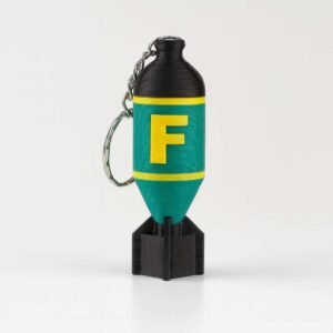 F bomb keychain 3D printed in PLA with teal body and yellow F