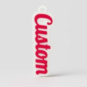 Personalised name bag tag with raised red name on white base