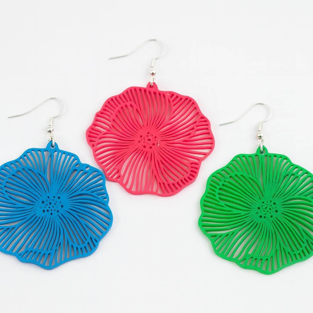 3D printed flower earrings shown in blue, pink, and green colorways