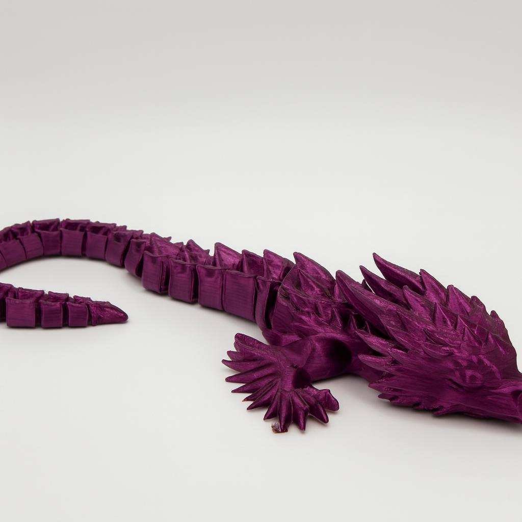 Dual color flexi dragon close-up showing spines and segmented tail