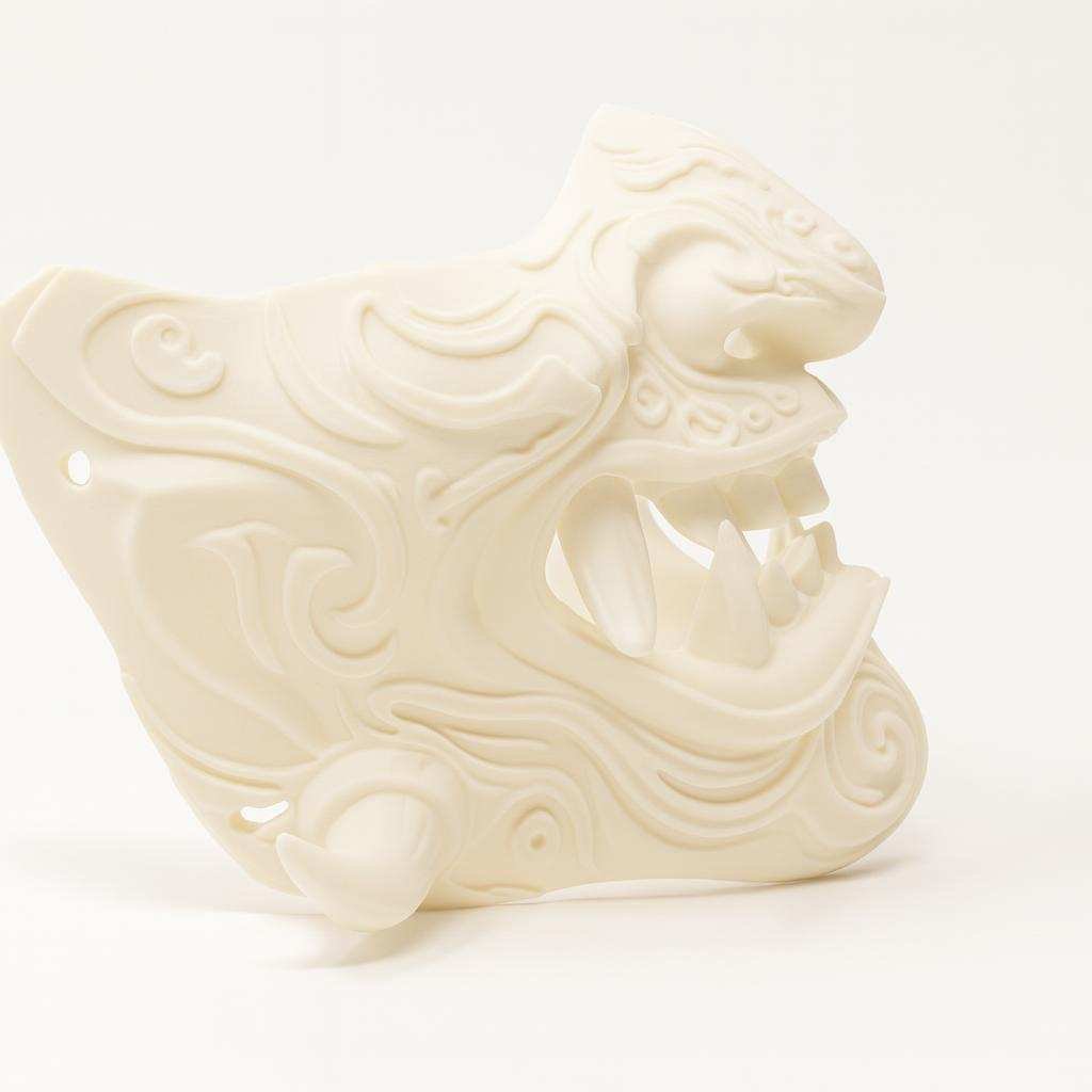 Ornamental oni mask side profile showing sculpted scrollwork