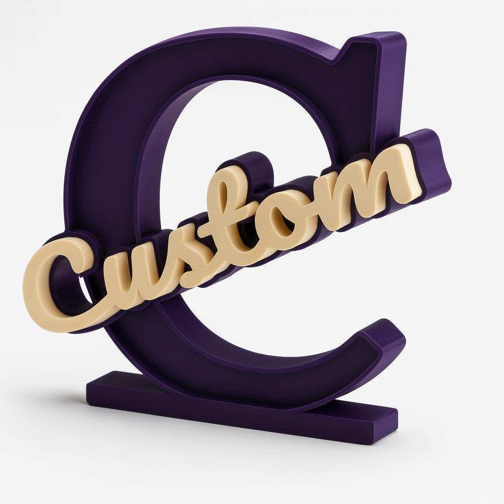 Custom name desk sign side view showing layered monogram and script name