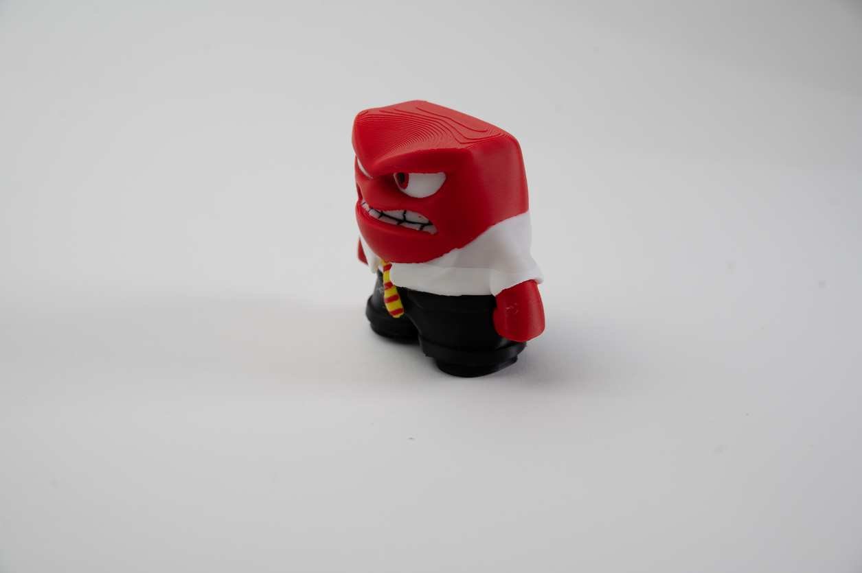 Side angle of 3D printed anger figurine desk decor
