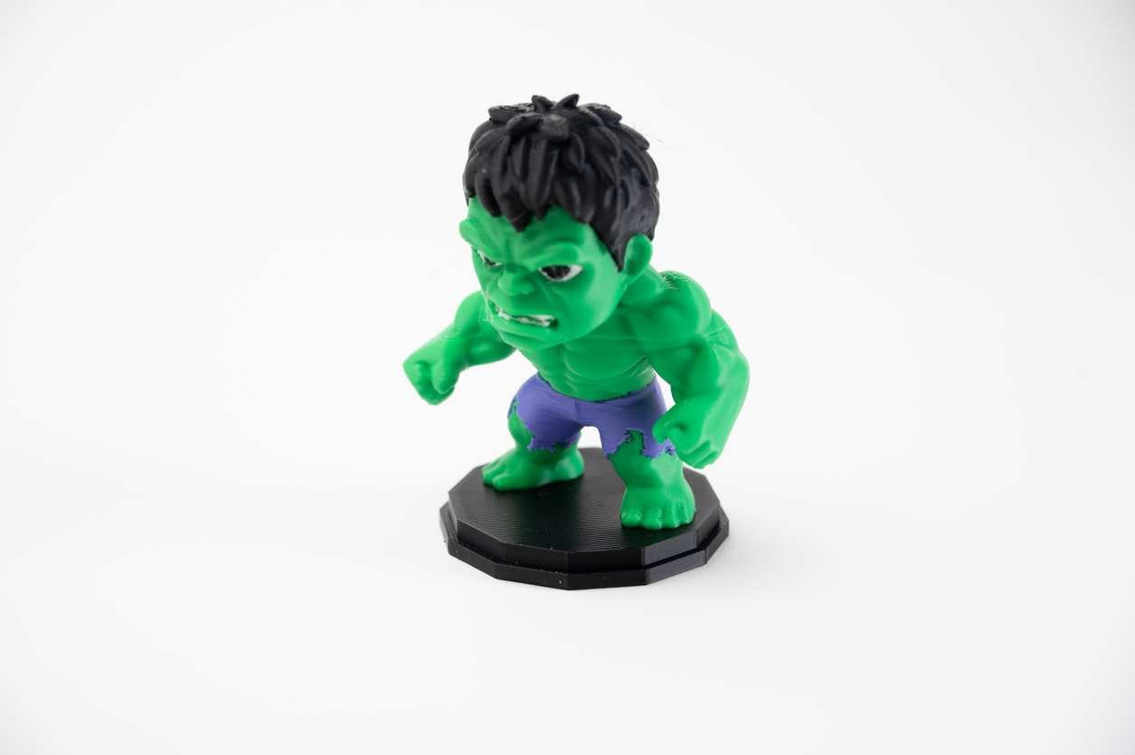 Side angle of PLA desk figurine on display base