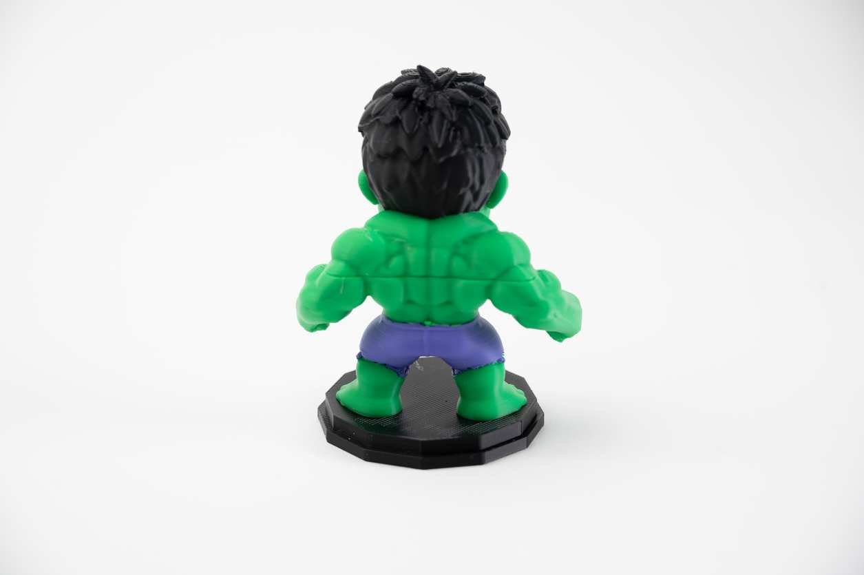 Rear view of 3D printed figure showing sculpted back detail