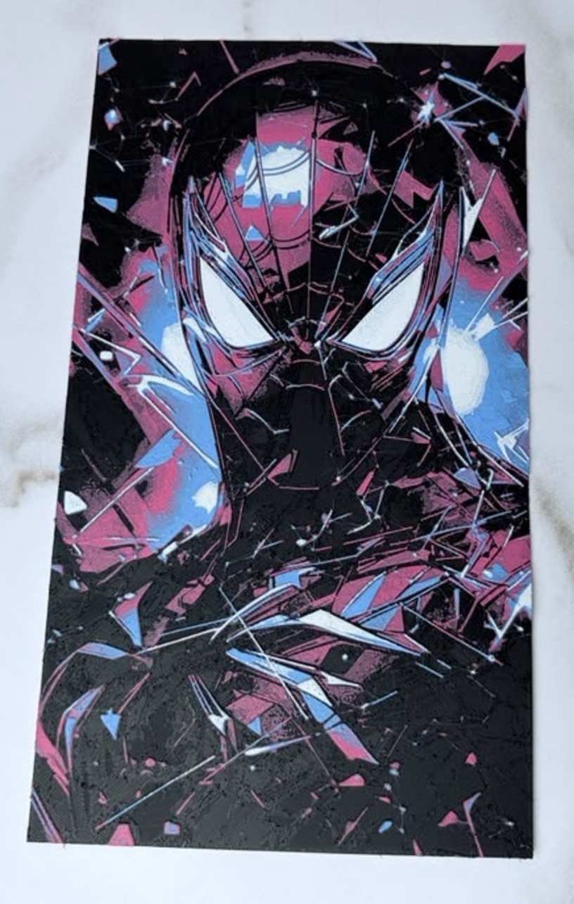 3D printed superhero wall art panel featuring a masked hero with shattered glass effect