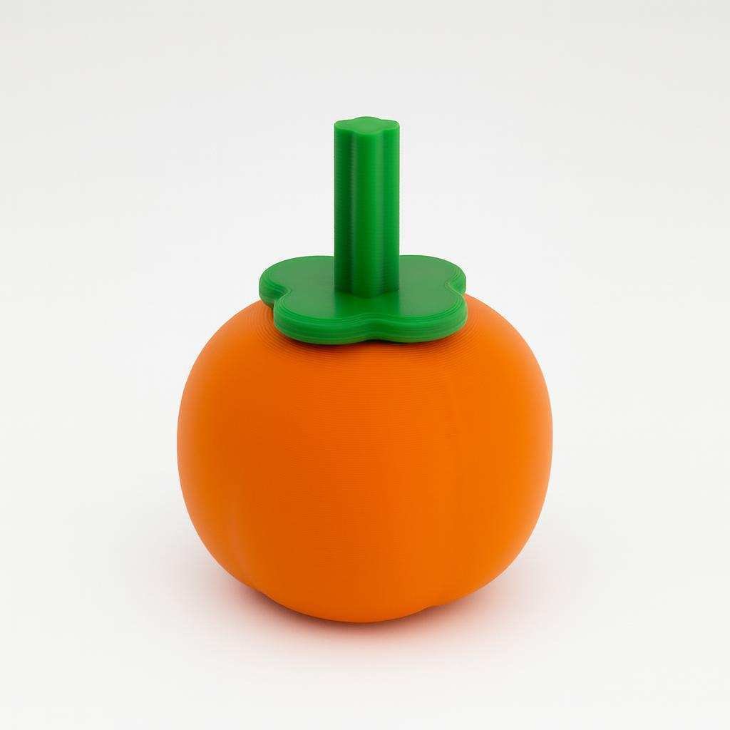Telescopic persimmon fidget toy closed in orange with green top