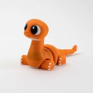 Flexi dinosaur fidget toy in orange PLA with big eyes