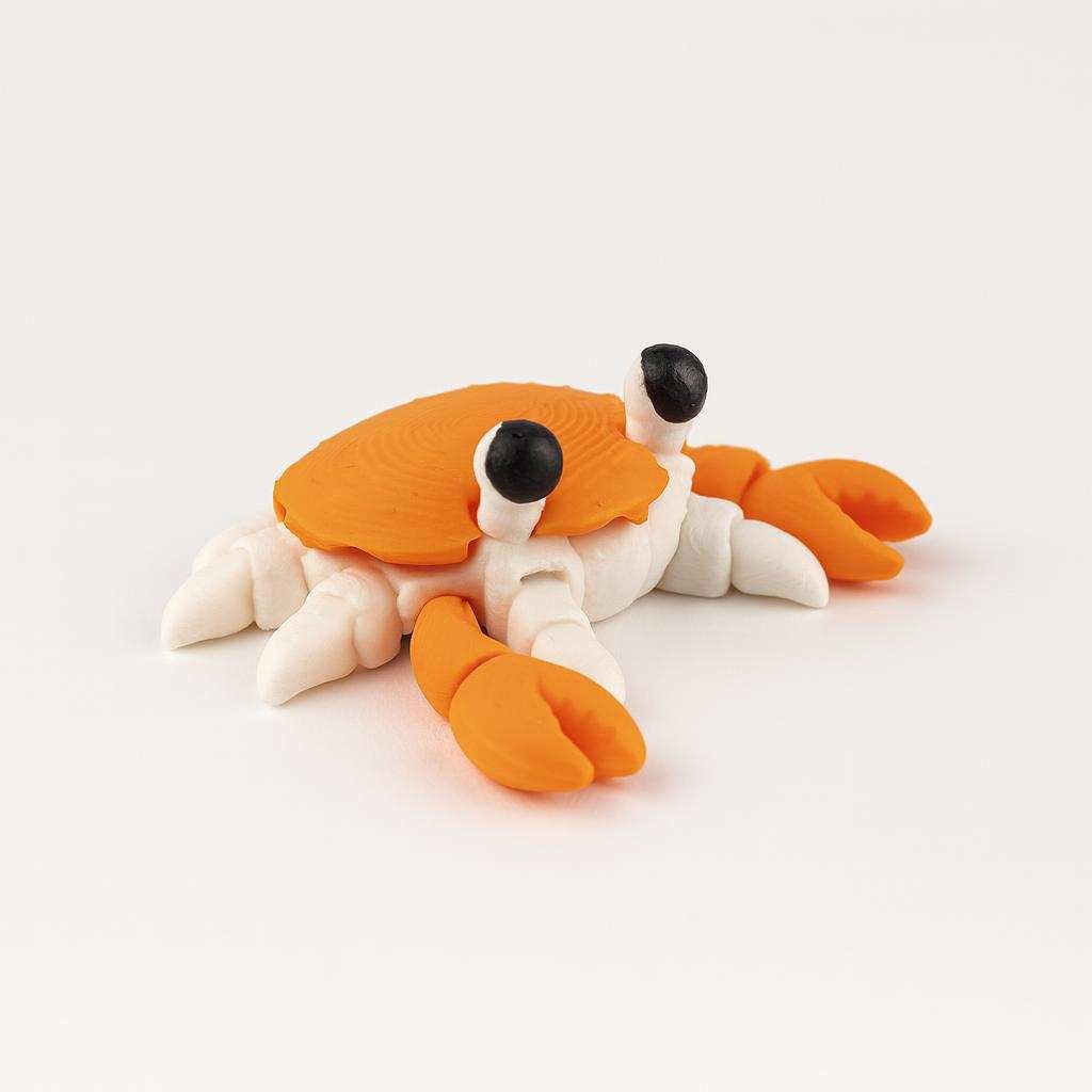 Articulated 3D printed flexi crab showing poseable legs and claws