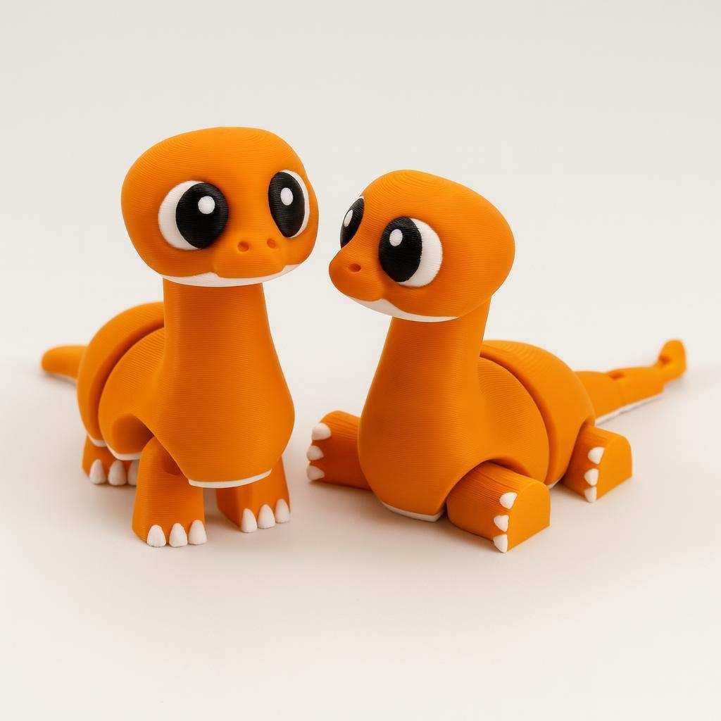 Articulated Flexi Dino 3D printed dinosaur posed on desk