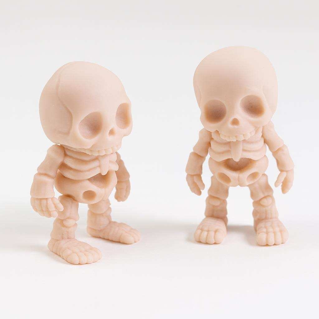 tiny flexi skeleton figure showing articulated arms and legs
