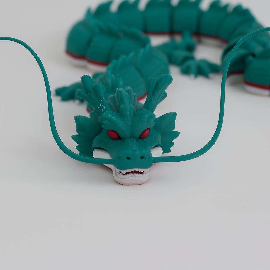 Close-up of 3D printed flexi dragon face and whiskers