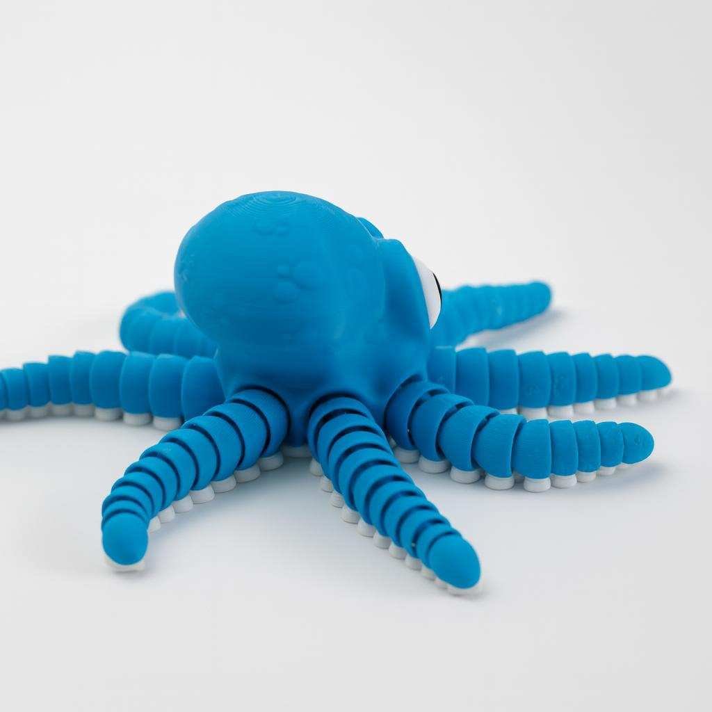 Side view of the articulated octopus fidget toy showing tentacle segments