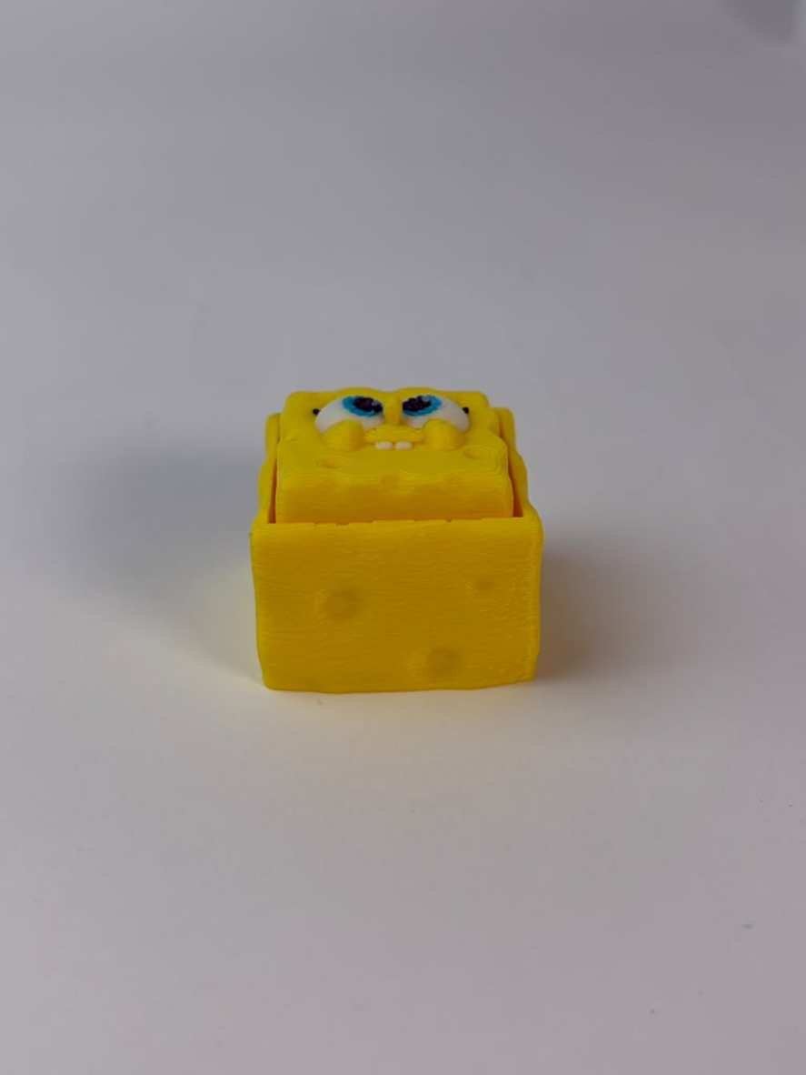 Spongebob fidget clicker side view showing square body
