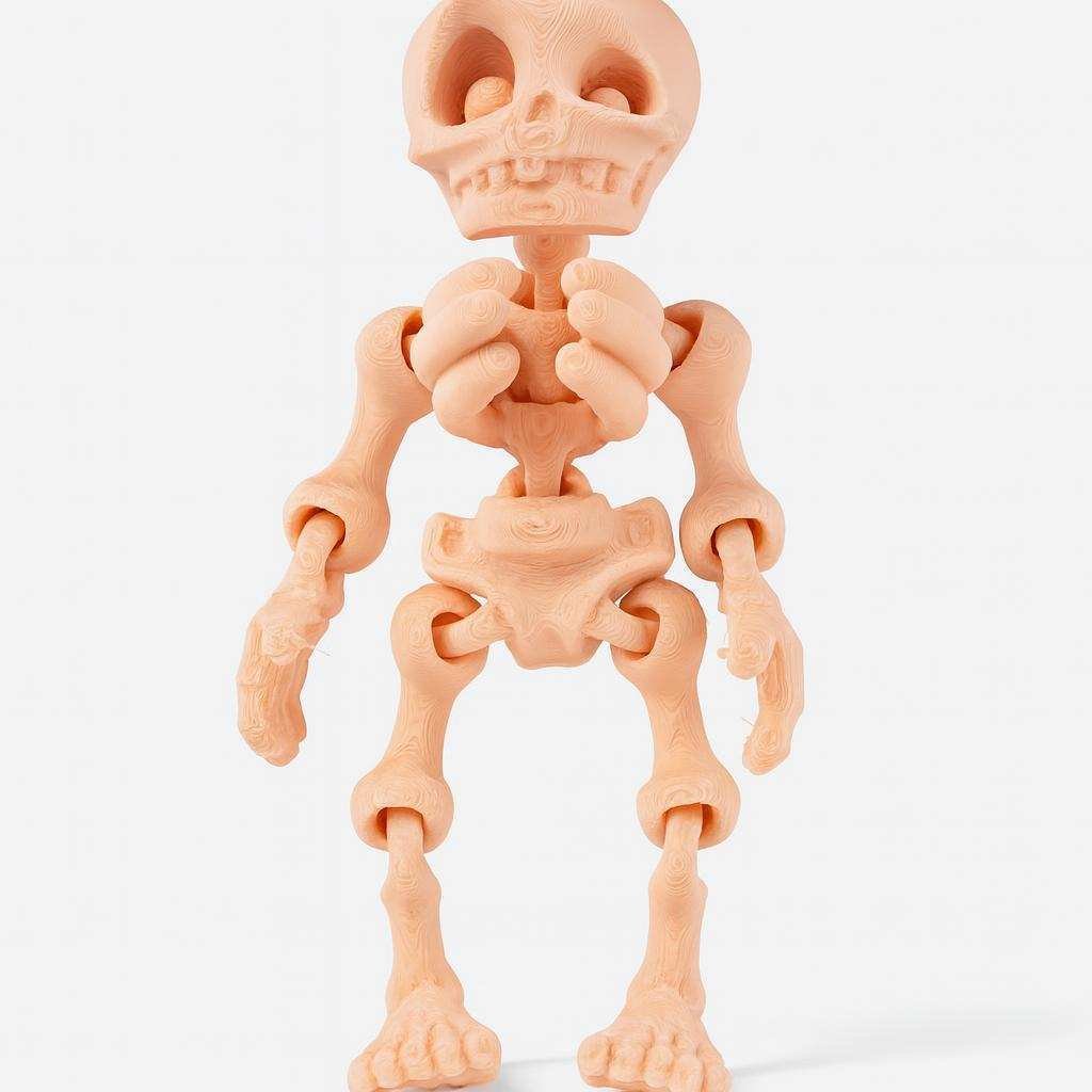 flexi mini skeleton toy 3D printed in PLA shown in light peach colour