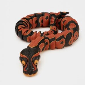 Articulated python fidget toy in black and gold, coiled pose